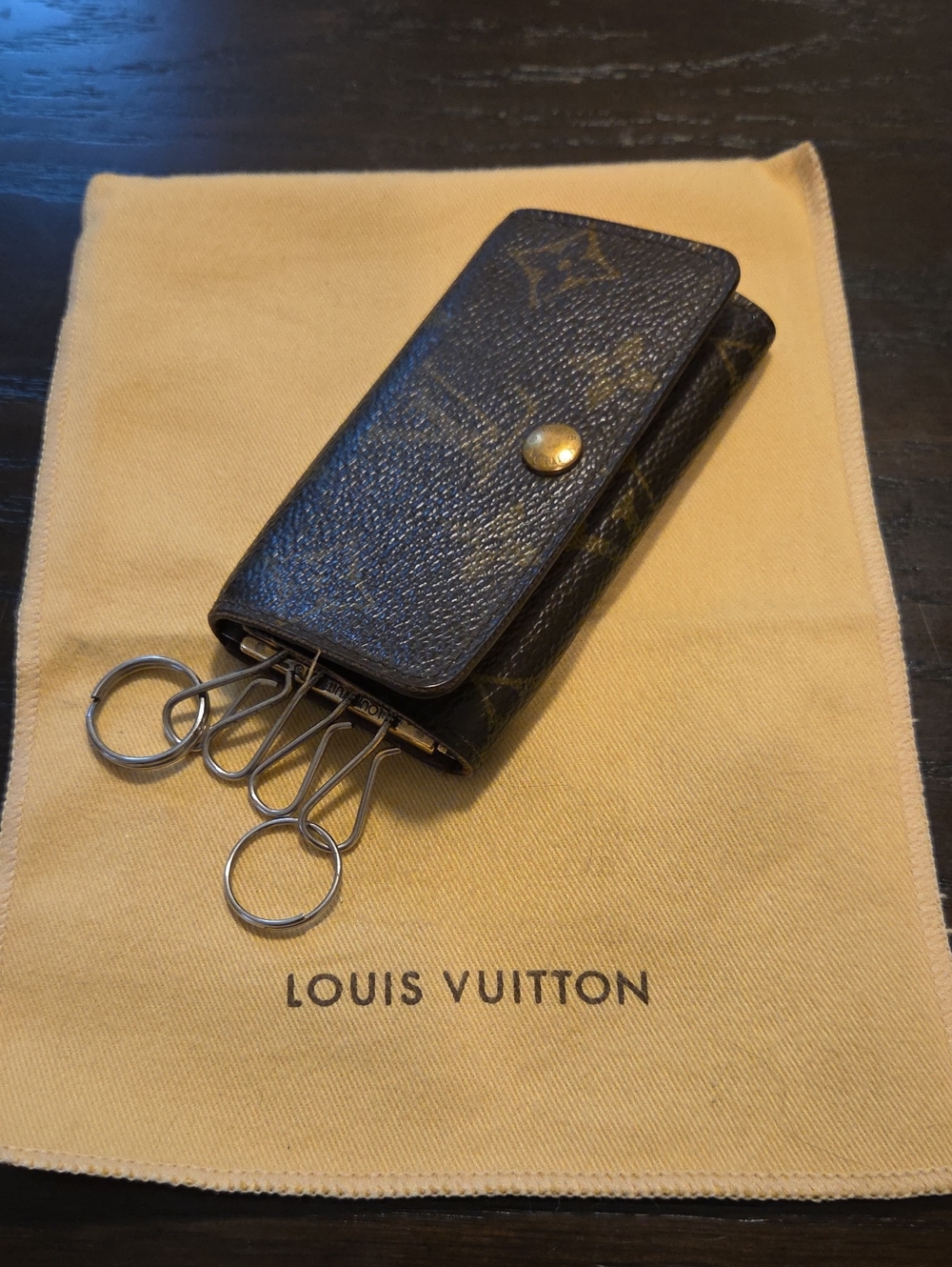 Louis Vuitton Monogram Canvas Key Holder in Brown with Gold-Tone Snap